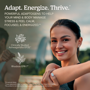 Adaptra® supplement capsule held between fingers