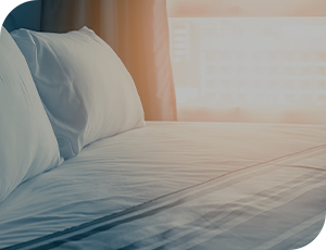 A person holds their shoulder